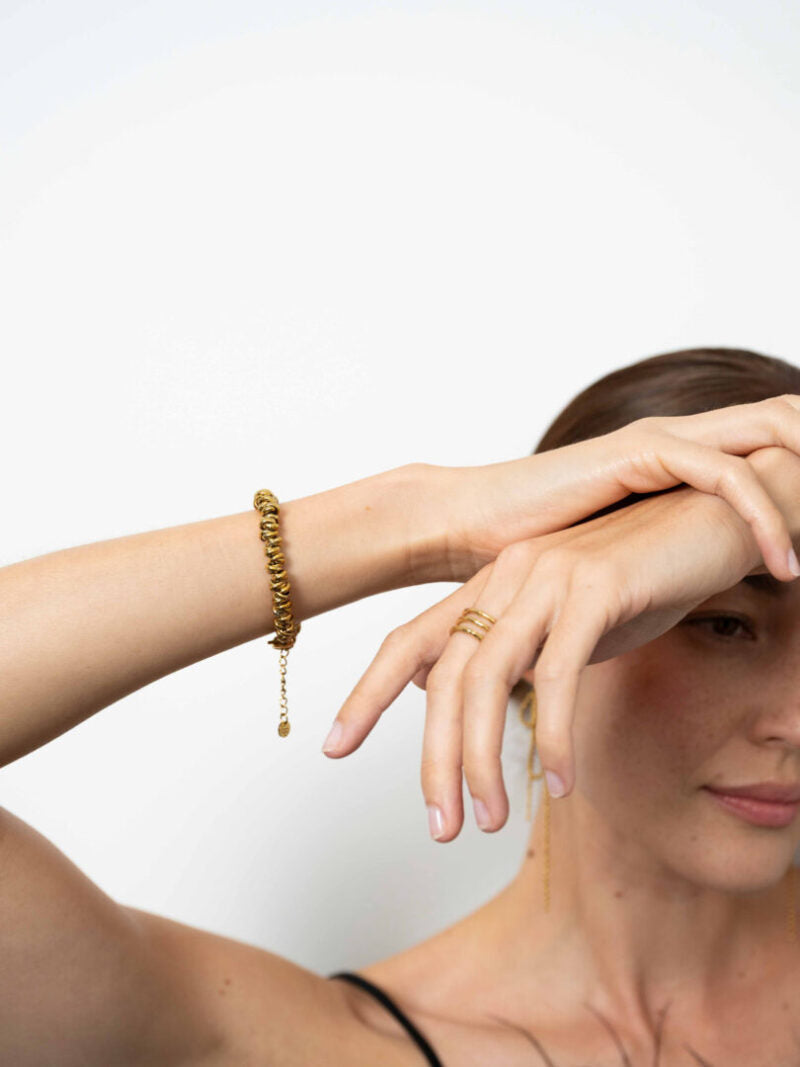 Armband met vergulde schakels