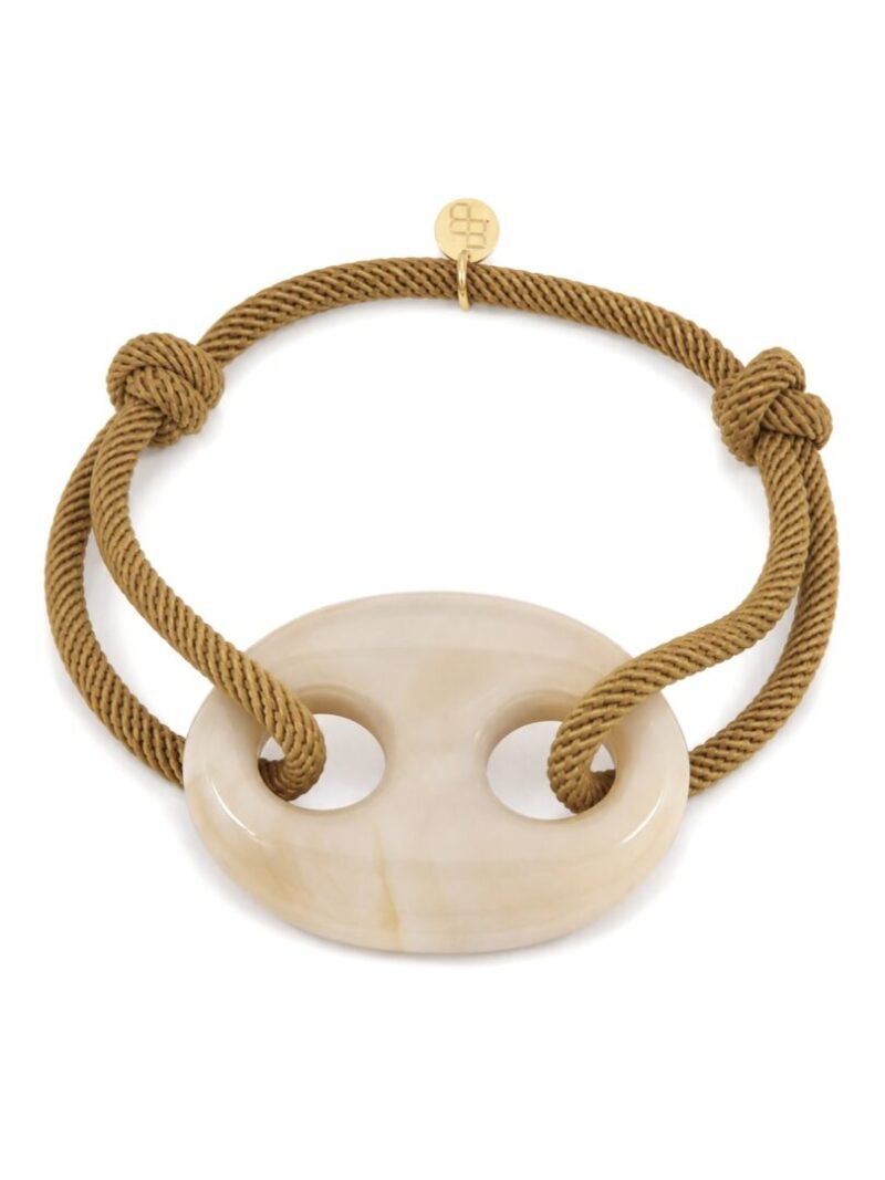 Armband met XL opengewerkte bedel / oker
