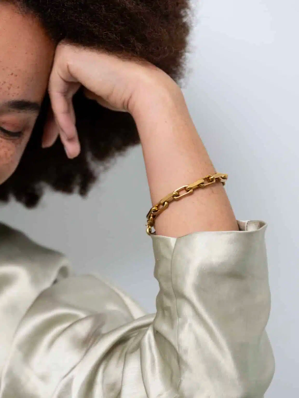 Grove ovale schakelarmband verguld